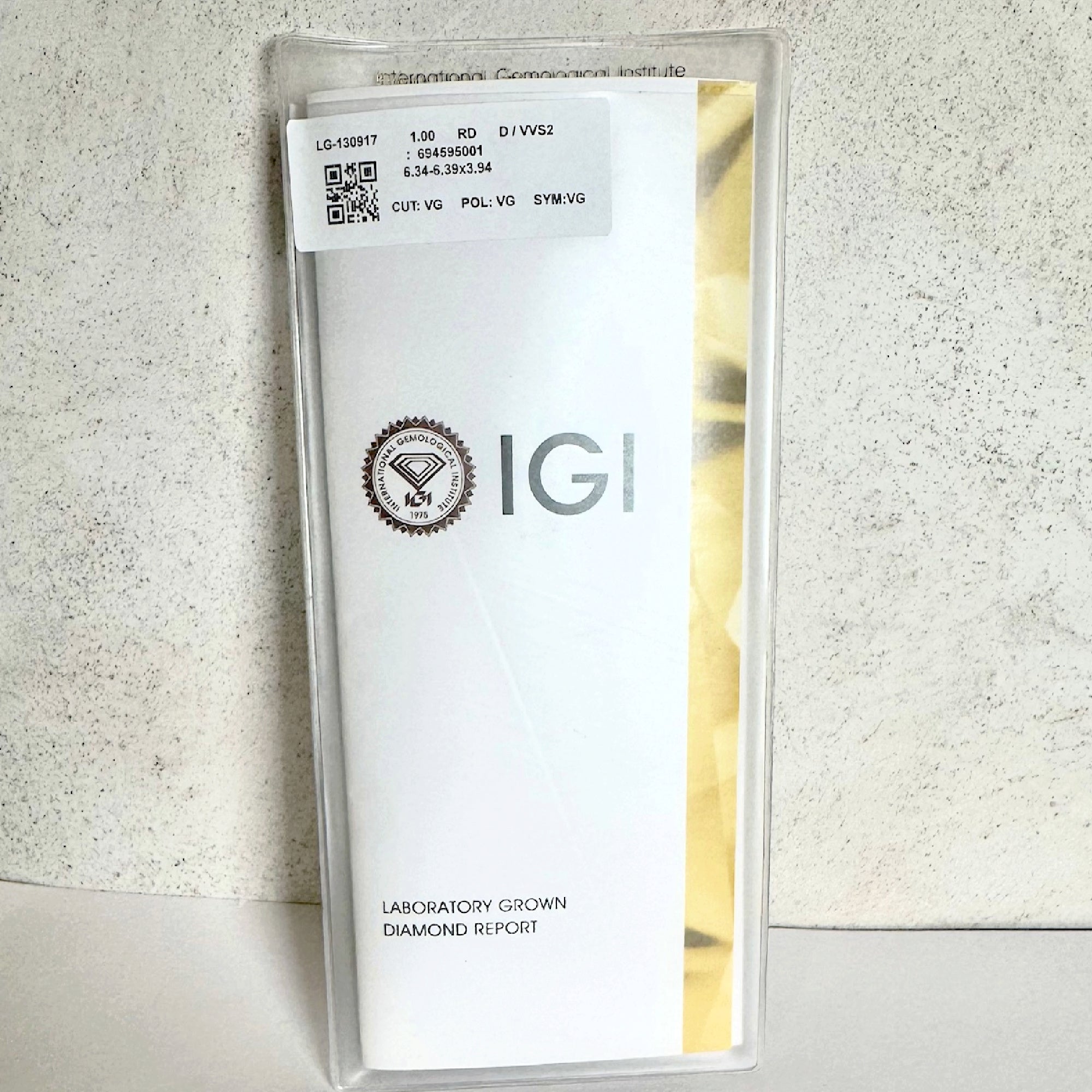 IGI Certified 0.60ct D VS1 Lab Diamond Three-Stone Engagement Ring with Trillion Accents