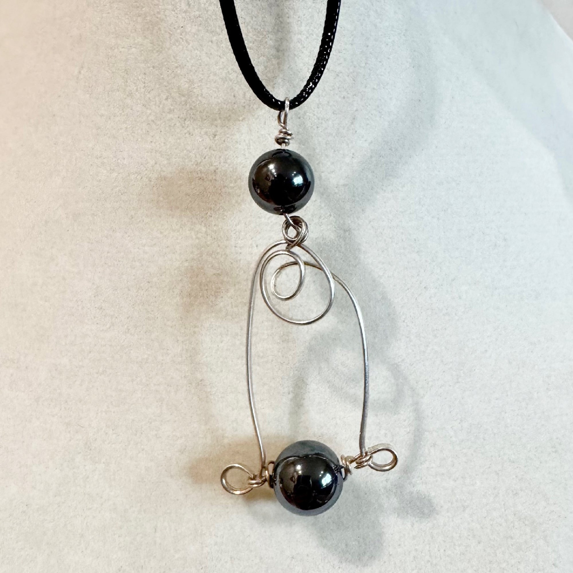 Contemporary Hematite and Silver Wire Pendant