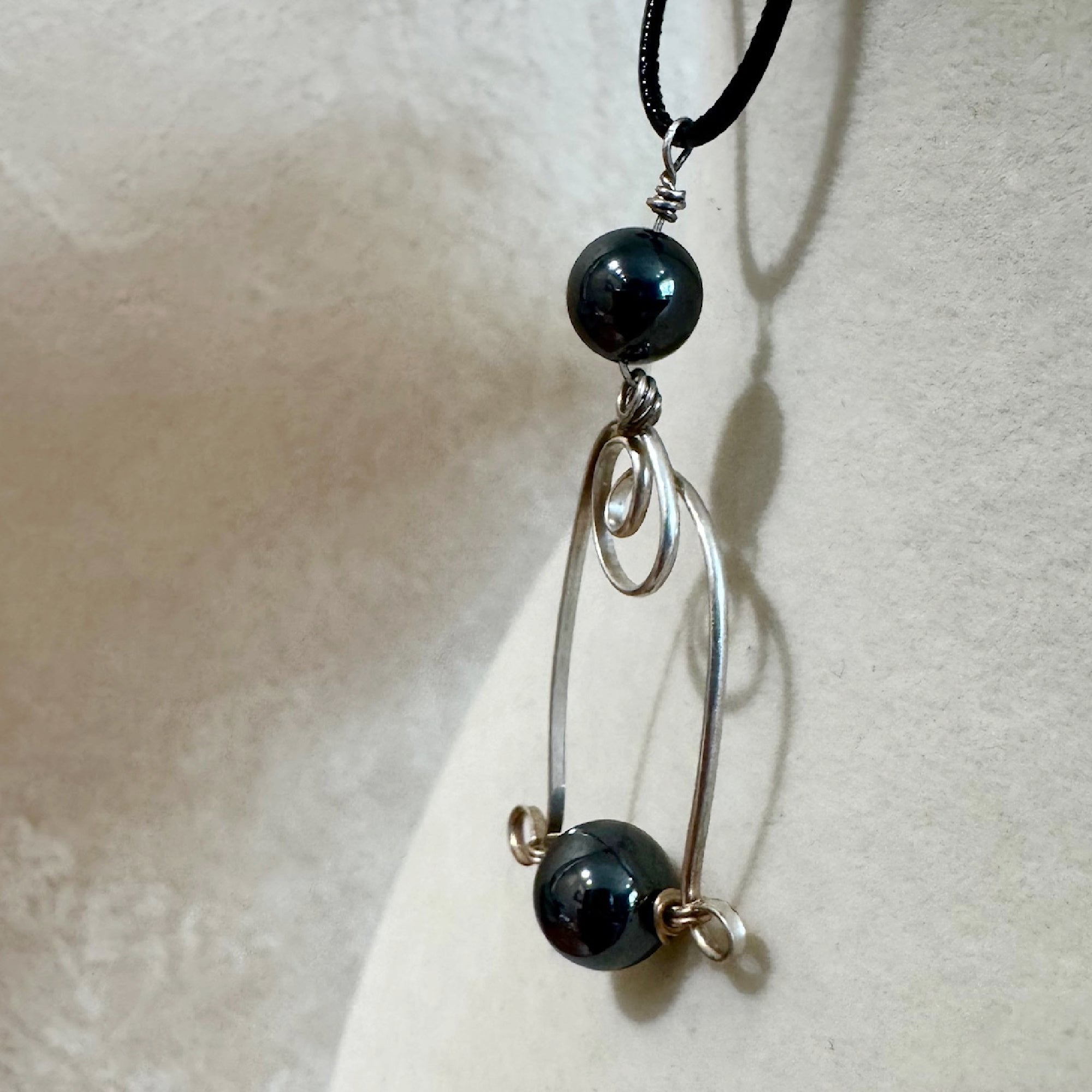 Contemporary Hematite and Silver Wire Pendant