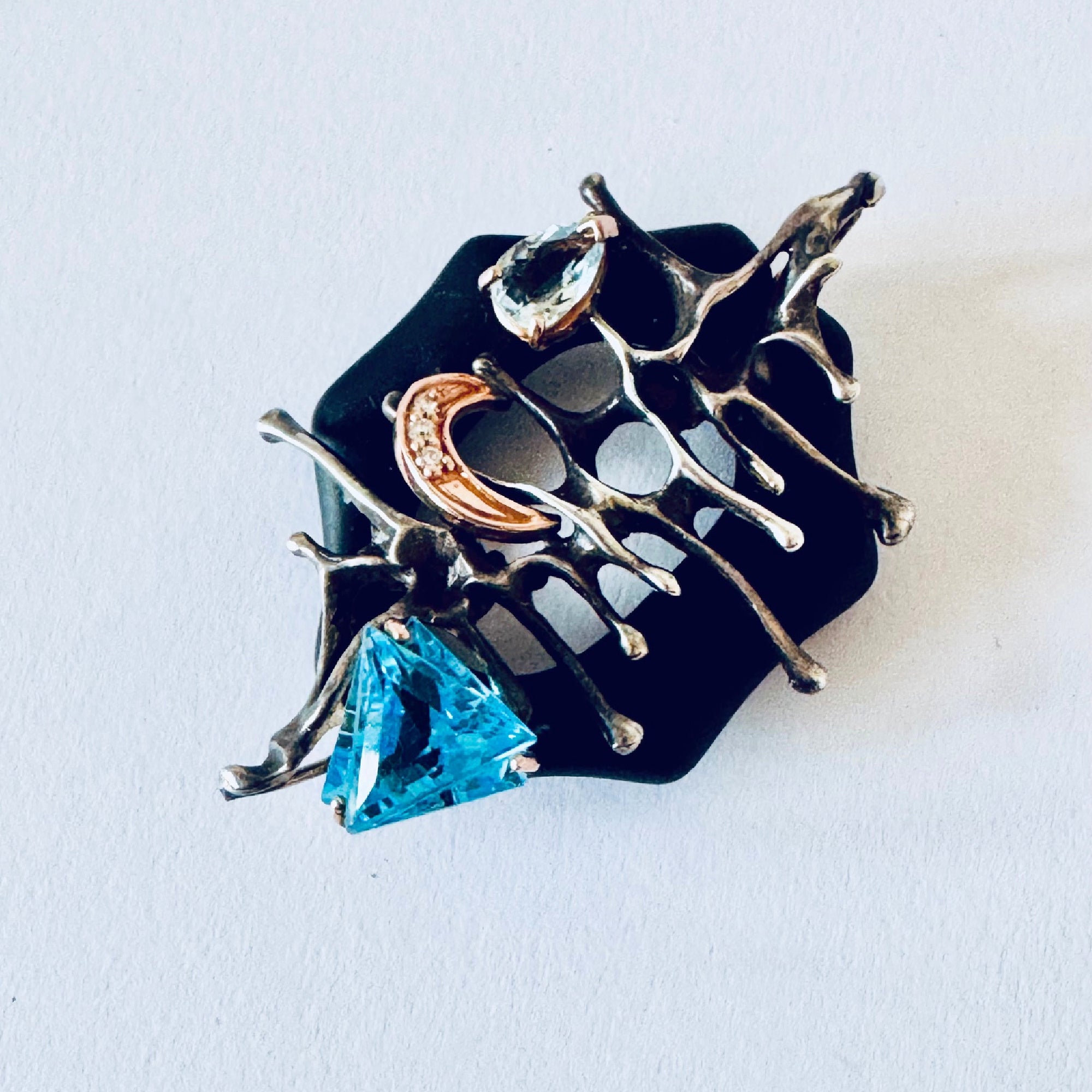 Black Onyx Pendant with Blue Topaz, Rose Gold & Sterling Silver