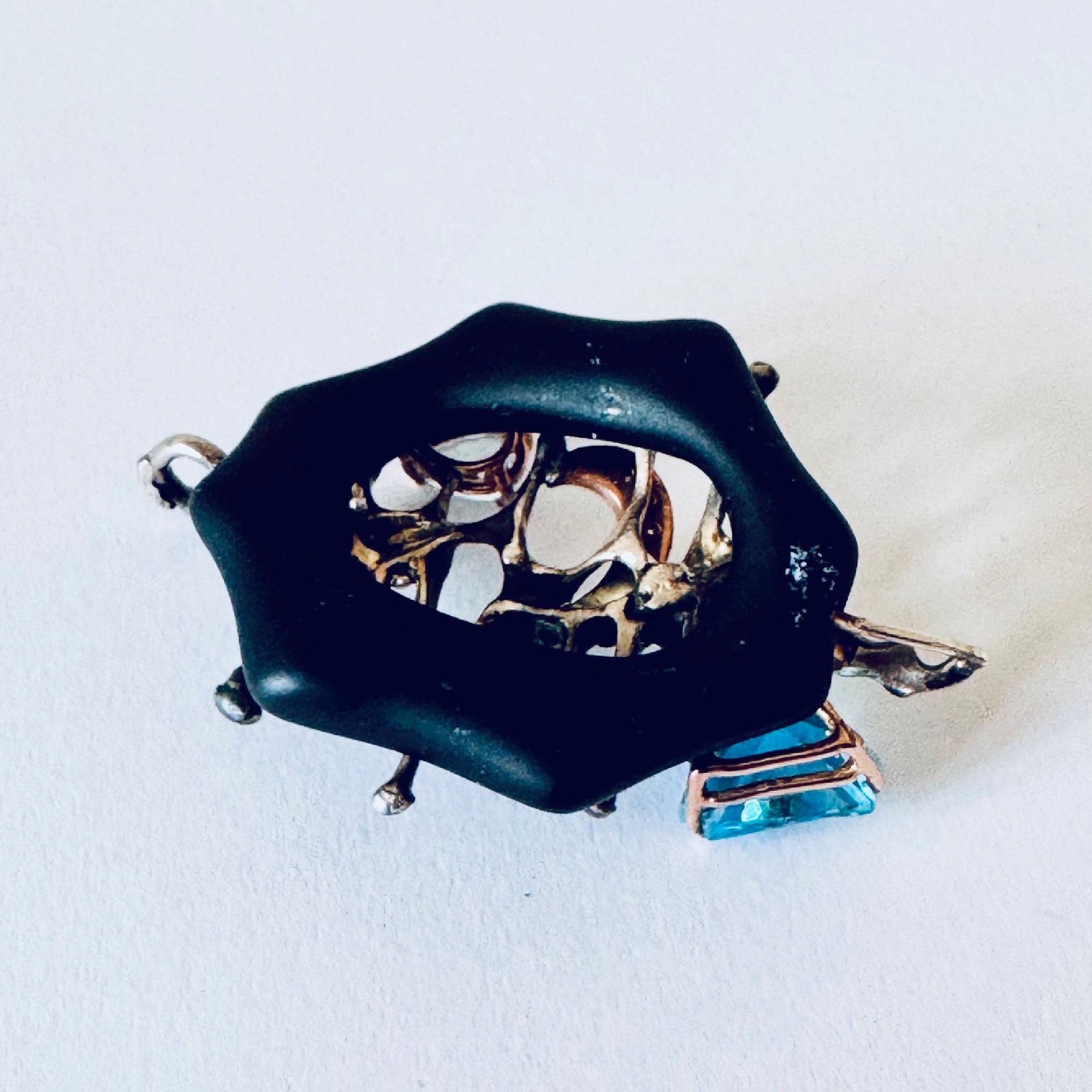 Black Onyx Pendant with Blue Topaz, Rose Gold & Sterling Silver