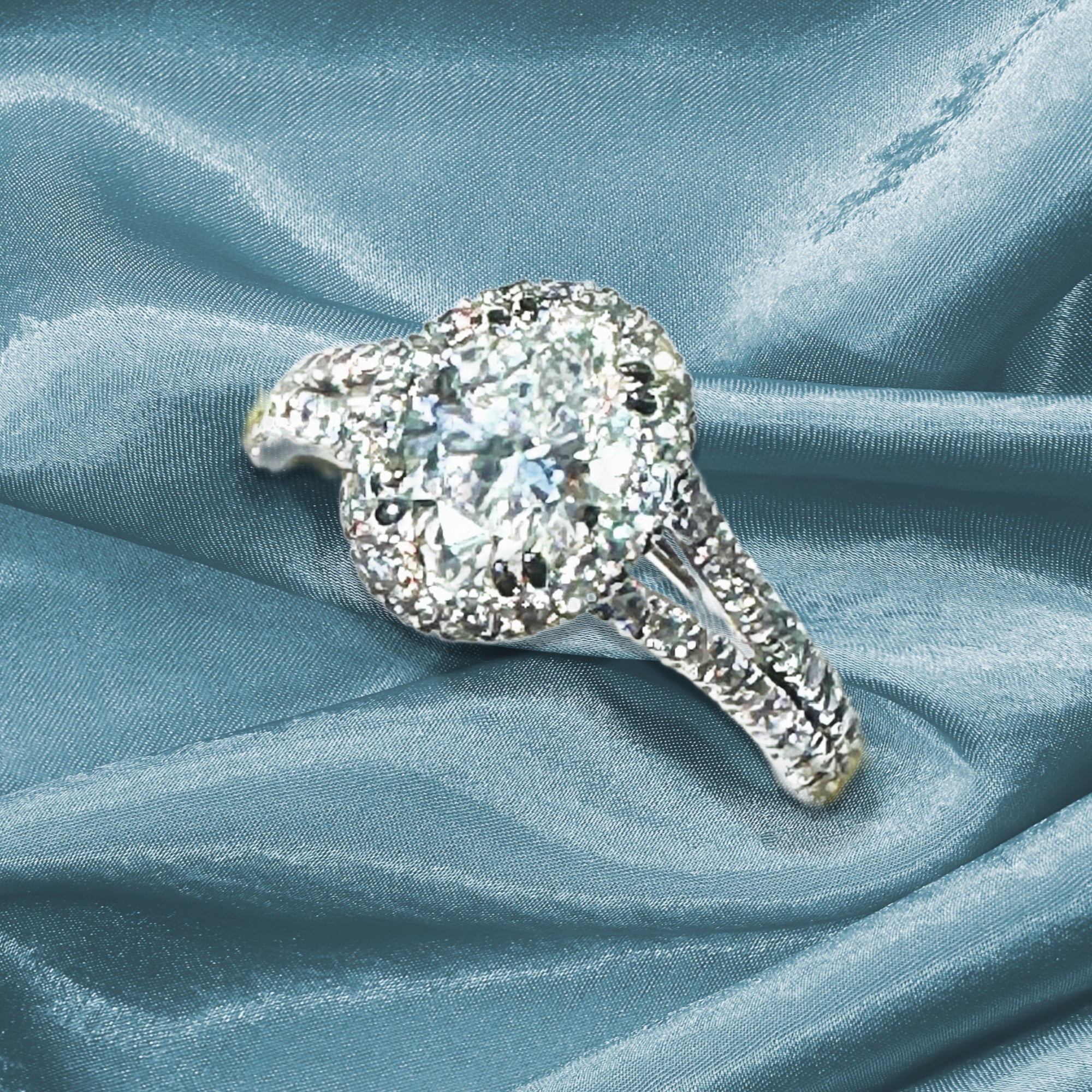 IGI Certified 1.11ct E VVS2 Oval Lab Diamond Halo Engagement Ring in 18K White Gold