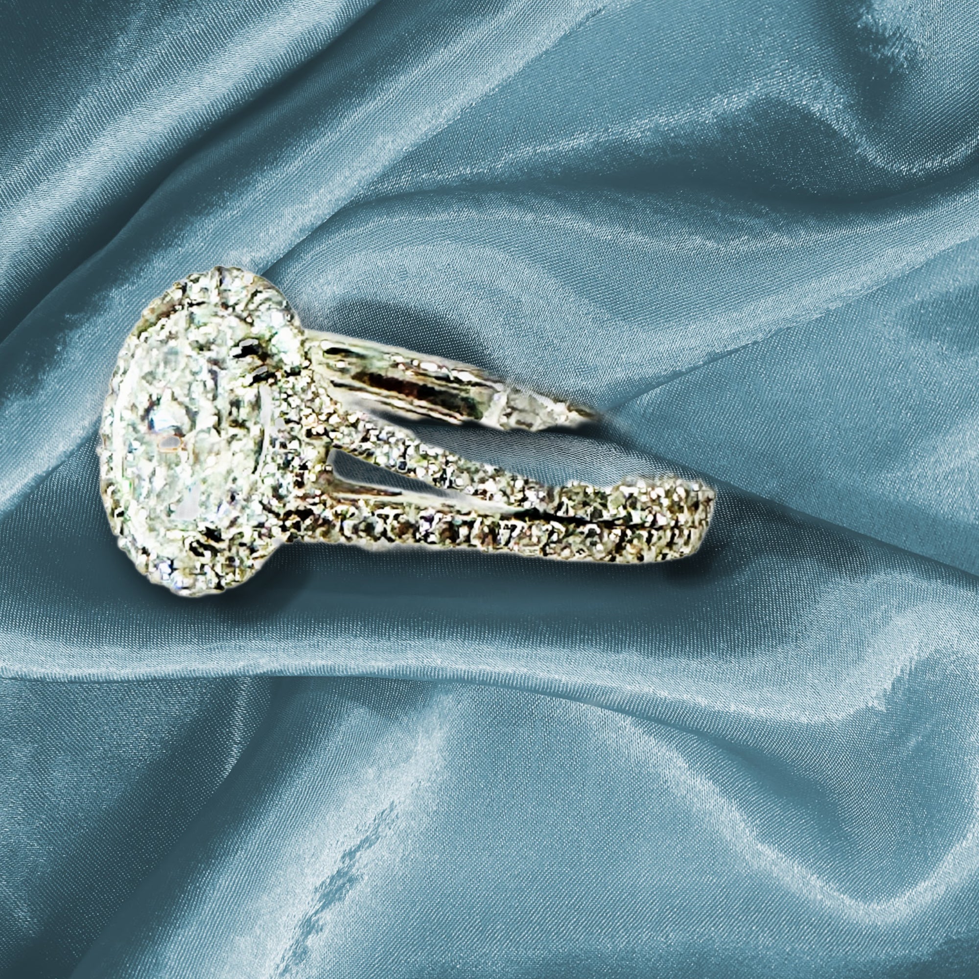 IGI Certified 1.11ct E VVS2 Oval Lab Diamond Halo Engagement Ring in 18K White Gold