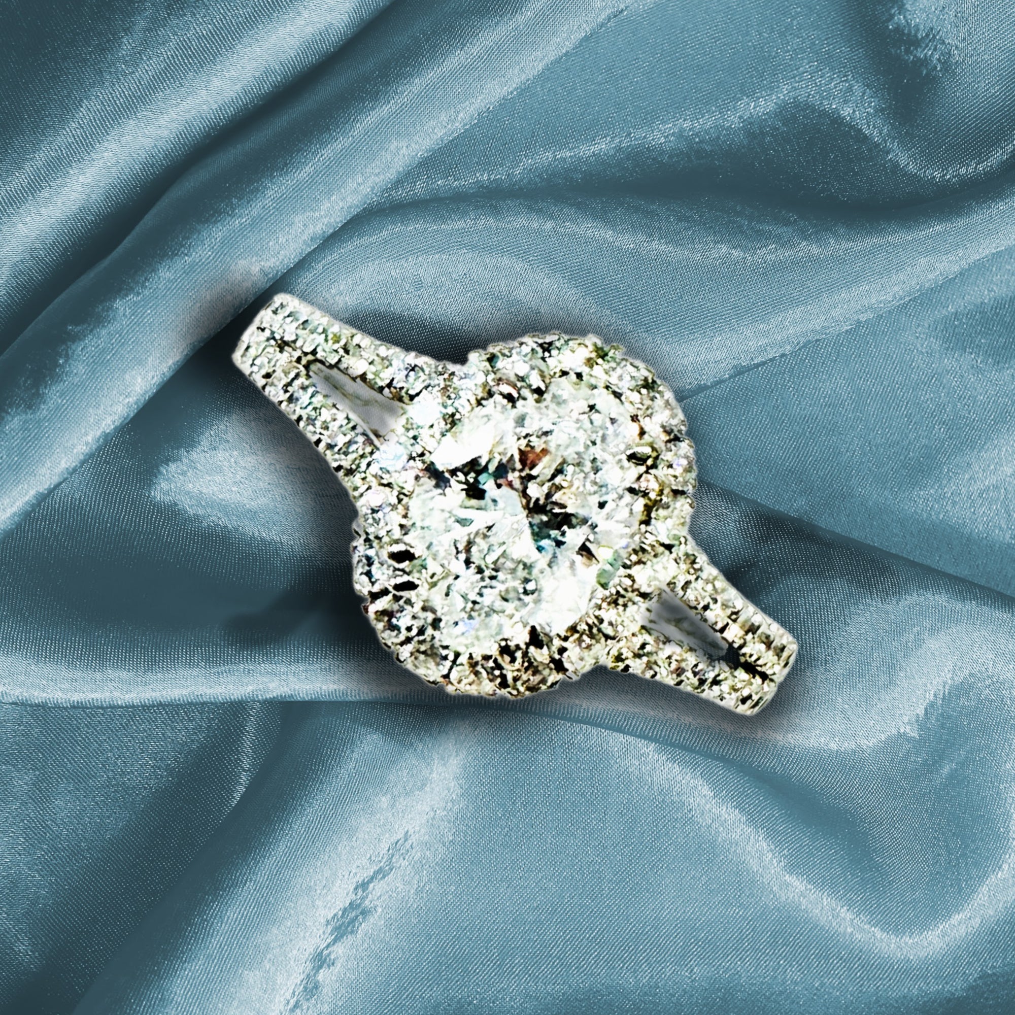 IGI Certified 1.11ct E VVS2 Oval Lab Diamond Halo Engagement Ring in 18K White Gold