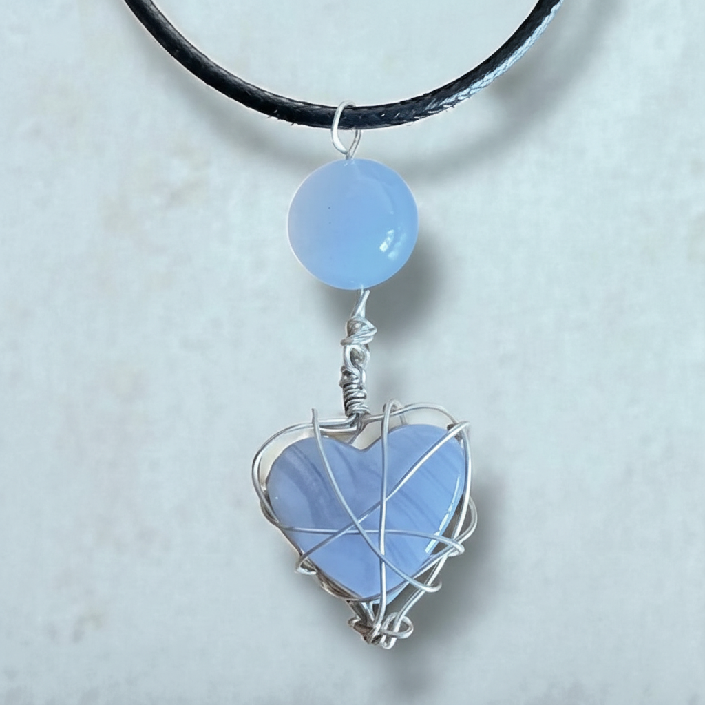 Blue heart pendant close-up detail