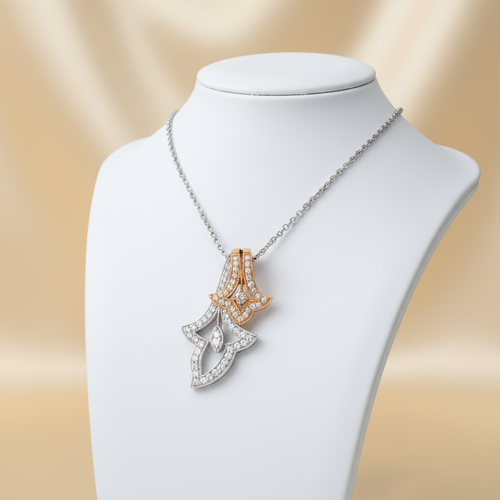 Two-tone diamond pendant on display stand