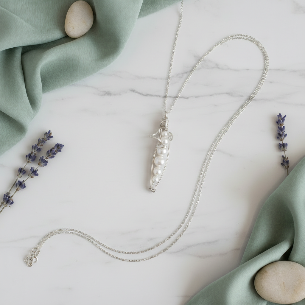 Pearl pod pendant flat lay